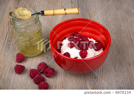healthy breakfast with yogurt, raspberry and jam 9970134