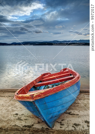 Boat on a lake in the mountains 9972017