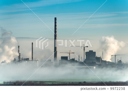 Factory chimneys and clouds of steam Factory chimneys and clouds of steam 9972238