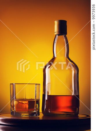 Whiskey Bottle and Glass 9973936