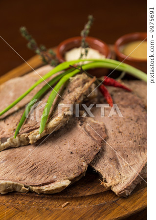 sliced boiled meat presentation on wood board sliced boiled meat presentation on wood board 9975691