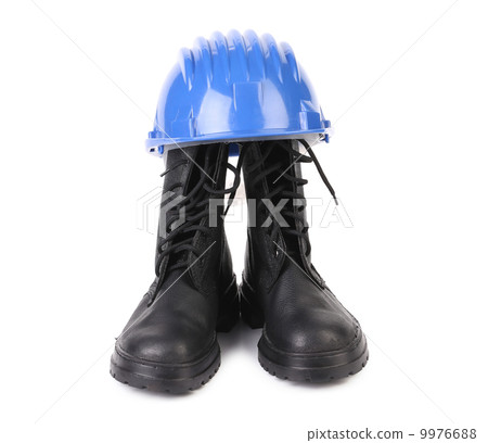 Hard hat and working boots. 9976688