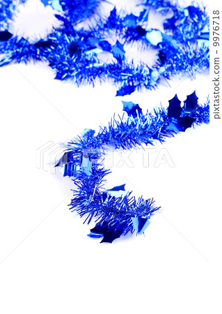 Christmas blue tinsel with stars. 9976718