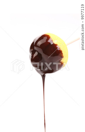 Marshmallow with chocolate dripping. Marshmallow with chocolate dripping. 9977119