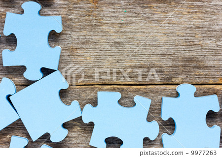 Puzzle on wooden boards Puzzle on wooden boards 9977263