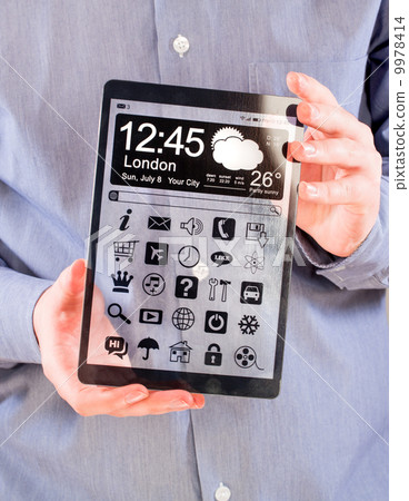 Tablet with transparent screen in human hands. Tablet with transparent screen in human hands. 9978414