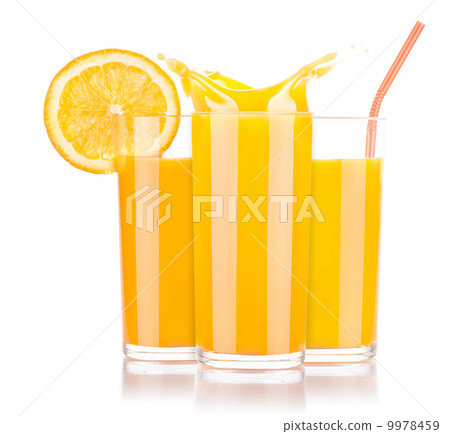 Fresh orange juice in glass with splash 9978459