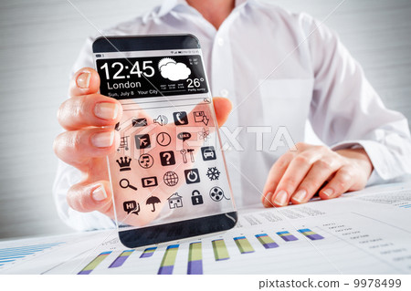 Smartphone with transparent screen in human hands. Smartphone with transparent screen in human hands. 9978499