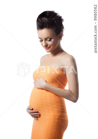 Happy stylish pregnant woman isolated on white Happy stylish pregnant woman isolated on white 9980562