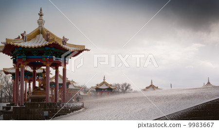 Buddhist temple in snowstorm 9983667