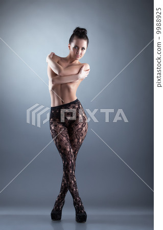 Attractive model advertises fashionable tights 9988925