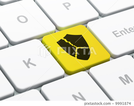 Security concept: Broken Shield on computer keyboard background 9991874