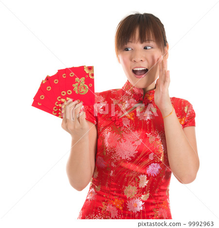 Surprise Chinese cheongsam girl holding red packets 9992963