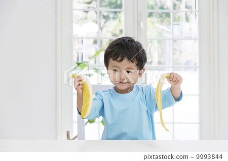 Banana peeling boy 9993844