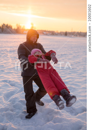 father with her daughter in winter 10001602