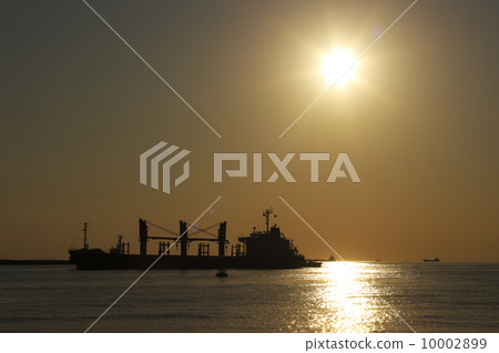 Sunset and cargo ship 10002899