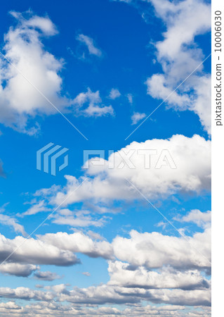 white fluffy clouds in blue sky 10006030