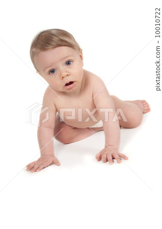 Baby boy crawling in studio isolated on white 10010722