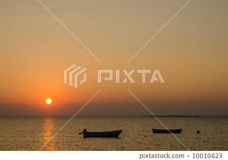 Boats at sunset Boats at sunset 10010823