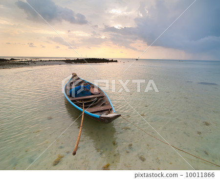 Sunset at tropical beach with Thai fishing boat 10011866
