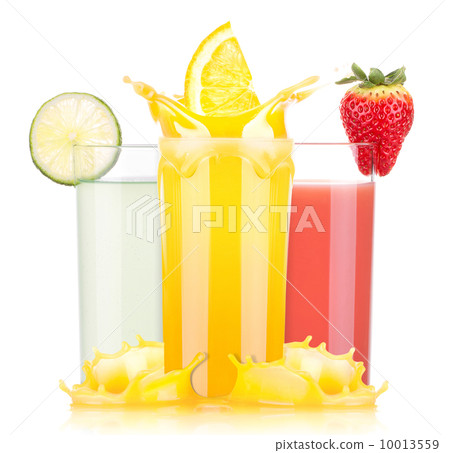 tasty summer fruit drinks in glass with splash 10013559