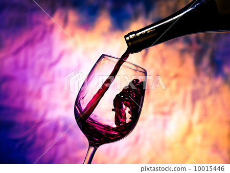 Red Wine Poured into Wineglass 10015446