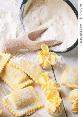 Pasta ravioli on flour 10020976