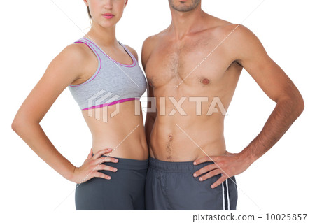 Mid section of a fit young couple Mid section of a fit young couple 10025857