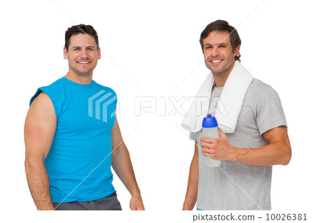 Portrait of two fit men with water bottle and towel Portrait of two fit men with water bottle and towel 10026381