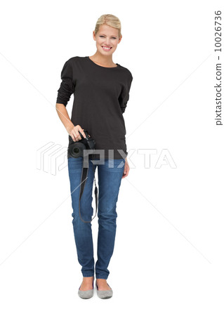 Full length portrait of a female photographer 10026736