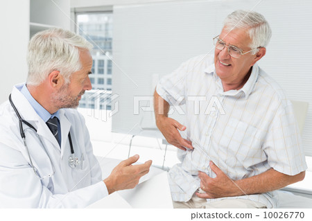 Male senior patient visiting a doctor Male senior patient visiting a doctor 10026770
