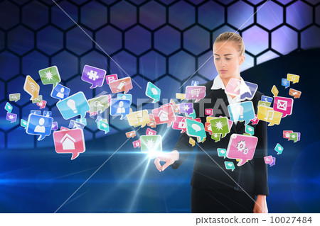 Blonde businesswoman touching app icon interface Blonde businesswoman touching app icon interface 10027484