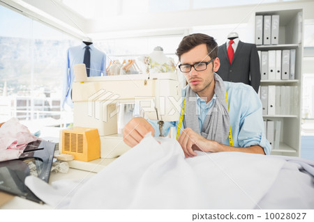 Male tailor sewing in workshop Male tailor sewing in workshop 10028027