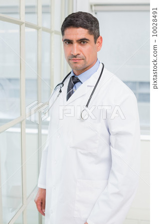 Portrait of a confident male doctor Portrait of a confident male doctor 10028491