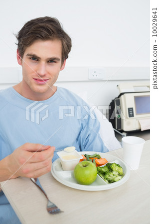 Patient eating healthy food in hospital 10029641