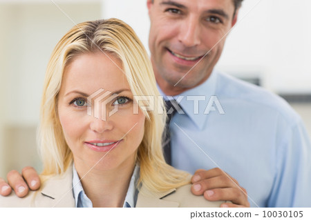 Closeup portrait of a smiling woman and man Closeup portrait of a smiling woman and man 10030105