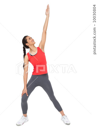 Full length of a sporty young woman stretching hand 10030804