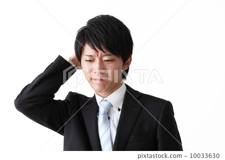 A headache-keeping businessman 10033630