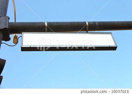 White road sign on a city street 10037028