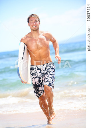 Surfer beach lifestyle people - man surfing 10037314