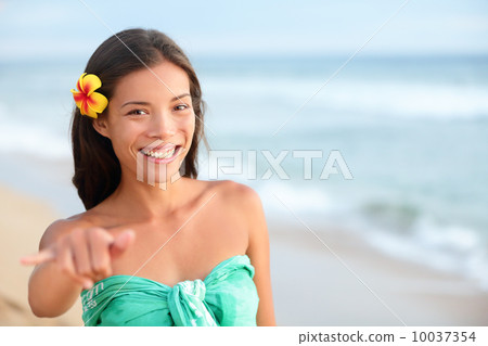 Hawaii beach smiling woman making shaka hand sign 10037354