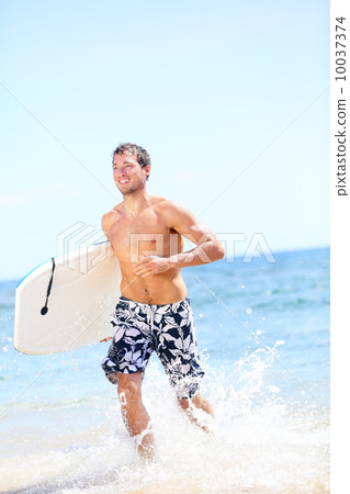 Summer beach fun surfer man running with bodyboard Summer beach fun surfer man running with bodyboard 10037374