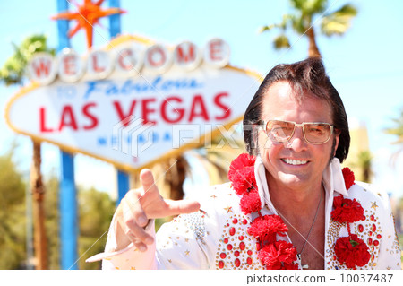 Elvis impersonator man in front of Las Vegas sign 10037487