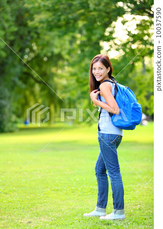 Student girl portrait wearing backpack outdoor 10037590