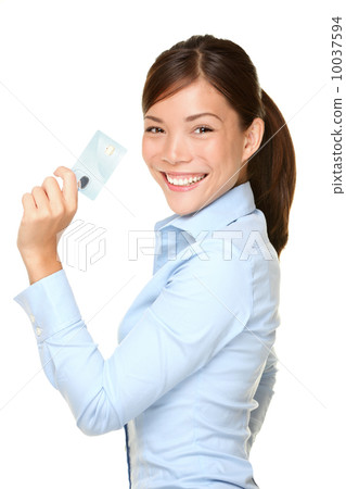 Casual business woman holding showing credit card Casual business woman holding showing credit card 10037594