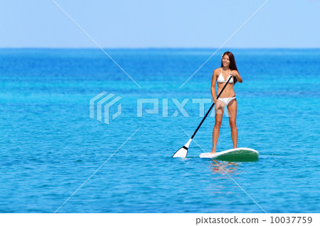 Stand up paddle board woman paddleboarding 10037759