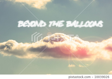 Beyond the balloons against bright blue sky with cloud 10039026