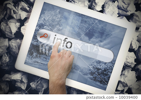 Hand touching info on search bar on tablet screen 10039400