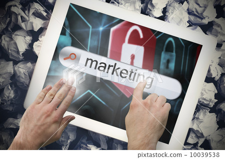 Hand touching marketing on search bar on tablet screen 10039538