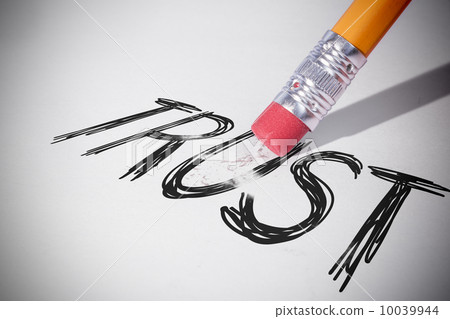 Pencil erasing the word Trust Pencil erasing the word Trust 10039944